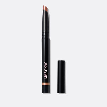 The Shimmer Eye Shadow Stick in shade Copper Nova stands on a white background with the cap off, clearly showing the slanted tip and shade.